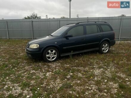 Синий Опель Астра, объемом двигателя 2 л и пробегом 300 тыс. км за 1799 $, фото 1 на Automoto.ua