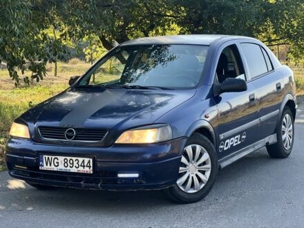 Синій Опель Астра, об'ємом двигуна 1.6 л та пробігом 250 тис. км за 1399 $, фото 1 на Automoto.ua