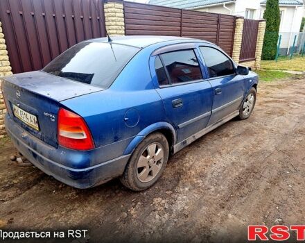 Синий Опель Астра, объемом двигателя 1.6 л и пробегом 206 тыс. км за 1600 $, фото 1 на Automoto.ua