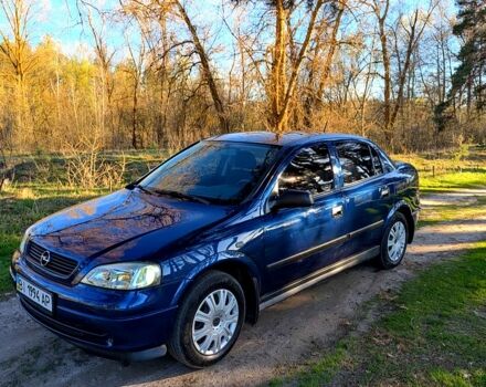 Синий Опель Астра, объемом двигателя 1.4 л и пробегом 234 тыс. км за 4400 $, фото 1 на Automoto.ua