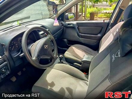 Синий Опель Астра, объемом двигателя 1.6 л и пробегом 225 тыс. км за 3100 $, фото 1 на Automoto.ua