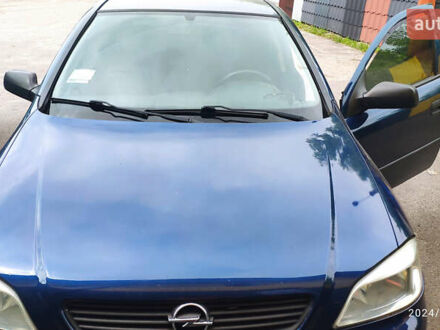 Синий Опель Астра, объемом двигателя 1.39 л и пробегом 330 тыс. км за 3100 $, фото 1 на Automoto.ua