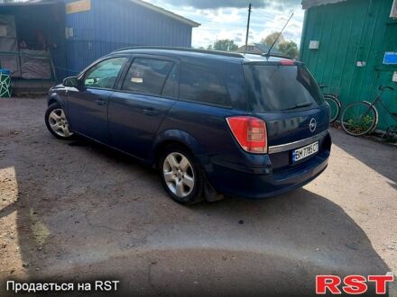 Синий Опель Астра, объемом двигателя 1.2 л и пробегом 330 тыс. км за 4200 $, фото 1 на Automoto.ua