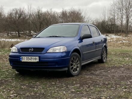 Синий Опель Астра, объемом двигателя 1.4 л и пробегом 202 тыс. км за 5000 $, фото 1 на Automoto.ua