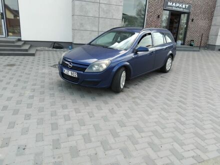 Синий Опель Астра, объемом двигателя 1.7 л и пробегом 300 тыс. км за 1750 $, фото 1 на Automoto.ua