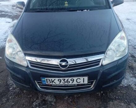 Синий Опель Астра, объемом двигателя 1.25 л и пробегом 208 тыс. км за 4650 $, фото 1 на Automoto.ua
