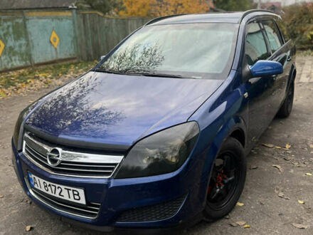 Синий Опель Астра, объемом двигателя 1.69 л и пробегом 250 тыс. км за 5000 $, фото 1 на Automoto.ua