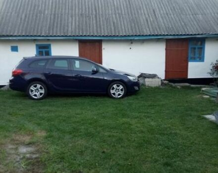 Синий Опель Астра, объемом двигателя 1.69 л и пробегом 240 тыс. км за 7200 $, фото 1 на Automoto.ua