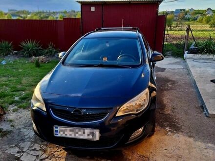 Синій Опель Астра, об'ємом двигуна 1.3 л та пробігом 180 тис. км за 5412 $, фото 1 на Automoto.ua