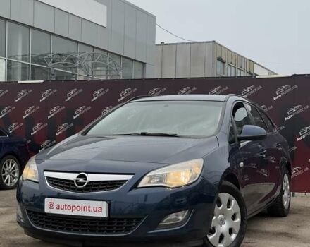 Синий Опель Астра, объемом двигателя 1.25 л и пробегом 214 тыс. км за 6500 $, фото 1 на Automoto.ua