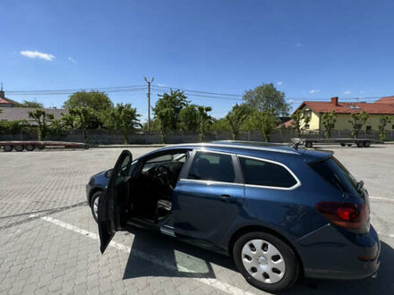 Синий Опель Астра, объемом двигателя 2 л и пробегом 240 тыс. км за 8100 $, фото 1 на Automoto.ua