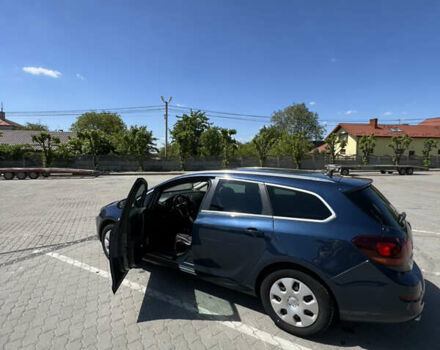 Синій Опель Астра, об'ємом двигуна 2 л та пробігом 240 тис. км за 8100 $, фото 1 на Automoto.ua