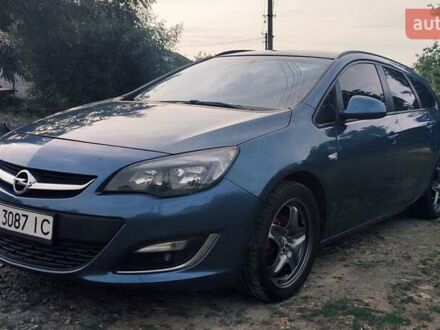 Синий Опель Астра, объемом двигателя 1.3 л и пробегом 265 тыс. км за 6000 $, фото 1 на Automoto.ua