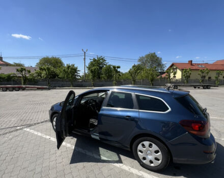 Синій Опель Астра, об'ємом двигуна 2 л та пробігом 240 тис. км за 7000 $, фото 1 на Automoto.ua