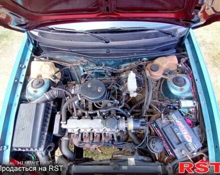 Зеленый Опель Астра, объемом двигателя 1.4 л и пробегом 400 тыс. км за 670 $, фото 6 на Automoto.ua