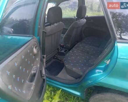 Зеленый Опель Астра, объемом двигателя 1.6 л и пробегом 253 тыс. км за 1299 $, фото 6 на Automoto.ua