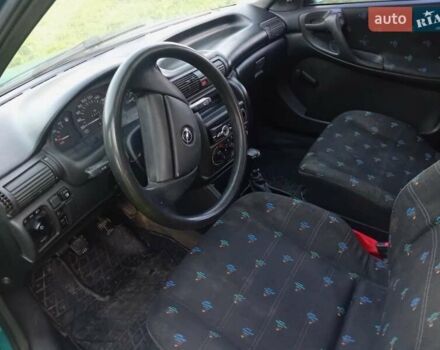 Зеленый Опель Астра, объемом двигателя 1.6 л и пробегом 253 тыс. км за 1299 $, фото 1 на Automoto.ua
