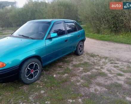 Зелений Опель Астра, об'ємом двигуна 1.6 л та пробігом 250 тис. км за 1699 $, фото 11 на Automoto.ua