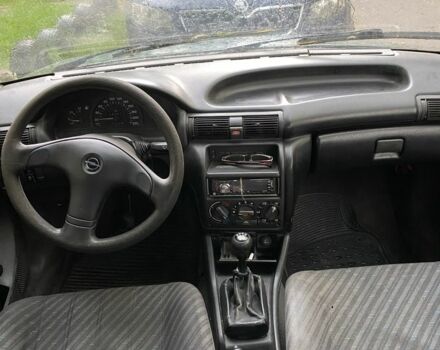 Зеленый Опель Астра, объемом двигателя 1.4 л и пробегом 342 тыс. км за 642 $, фото 6 на Automoto.ua