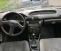 Зеленый Опель Астра, объемом двигателя 1.4 л и пробегом 342 тыс. км за 654 $, фото 6 на Automoto.ua