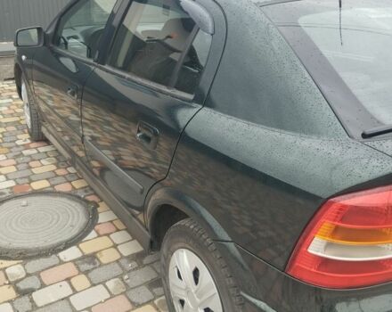 Зелений Опель Астра, об'ємом двигуна 1.4 л та пробігом 6 тис. км за 2063 $, фото 5 на Automoto.ua