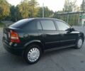 Зелений Опель Астра, об'ємом двигуна 1.4 л та пробігом 325 тис. км за 2493 $, фото 1 на Automoto.ua