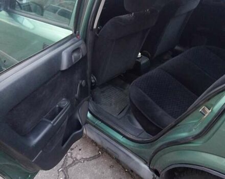 Зелений Опель Астра, об'ємом двигуна 1.39 л та пробігом 411 тис. км за 1750 $, фото 9 на Automoto.ua