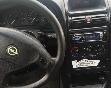 Зелений Опель Астра, об'ємом двигуна 1.4 л та пробігом 6 тис. км за 2063 $, фото 6 на Automoto.ua