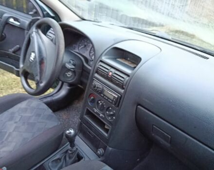 Зелений Опель Астра, об'ємом двигуна 1.4 л та пробігом 335 тис. км за 1850 $, фото 16 на Automoto.ua