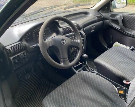 Зеленый Опель Астра, объемом двигателя 1.4 л и пробегом 342 тыс. км за 642 $, фото 3 на Automoto.ua