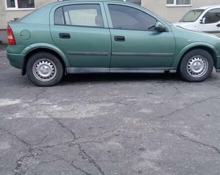 Зелений Опель Астра, об'ємом двигуна 1.39 л та пробігом 411 тис. км за 1750 $, фото 7 на Automoto.ua
