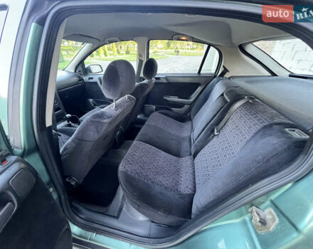 Зеленый Опель Астра, объемом двигателя 1.6 л и пробегом 205 тыс. км за 2500 $, фото 12 на Automoto.ua