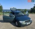 Зеленый Опель Астра, объемом двигателя 1.6 л и пробегом 303 тыс. км за 3399 $, фото 1 на Automoto.ua