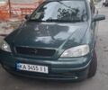 Зеленый Опель Астра, объемом двигателя 1.2 л и пробегом 210 тыс. км за 2106 $, фото 1 на Automoto.ua