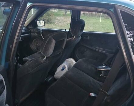 Зеленый Опель Астра, объемом двигателя 1.6 л и пробегом 317 тыс. км за 1500 $, фото 6 на Automoto.ua