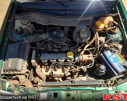 Зелений Опель Астра, об'ємом двигуна 1.4 л та пробігом 211 тис. км за 1500 $, фото 4 на Automoto.ua