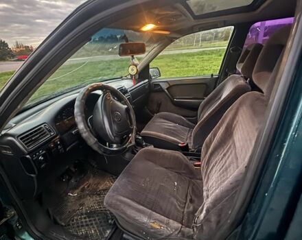 Зеленый Опель Астра, объемом двигателя 1.6 л и пробегом 491 тыс. км за 850 $, фото 4 на Automoto.ua