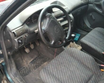 Зеленый Опель Астра, объемом двигателя 1 л и пробегом 200 тыс. км за 600 $, фото 4 на Automoto.ua