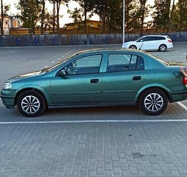 Зеленый Опель Астра, объемом двигателя 1.6 л и пробегом 410 тыс. км за 2900 $, фото 7 на Automoto.ua