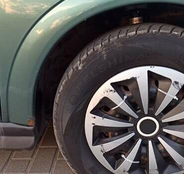 Зеленый Опель Астра, объемом двигателя 1.6 л и пробегом 410 тыс. км за 2900 $, фото 1 на Automoto.ua