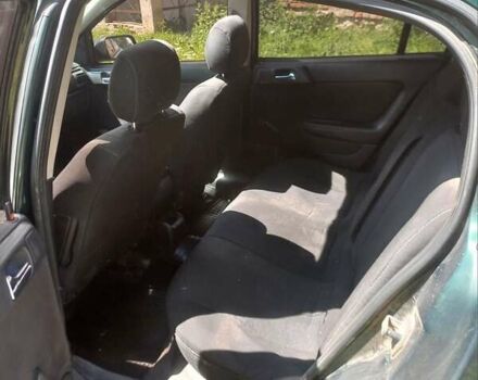 Зеленый Опель Астра, объемом двигателя 1.6 л и пробегом 390 тыс. км за 2700 $, фото 10 на Automoto.ua