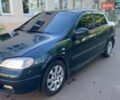 Зеленый Опель Астра, объемом двигателя 1.39 л и пробегом 370 тыс. км за 2300 $, фото 1 на Automoto.ua