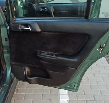 Зеленый Опель Астра, объемом двигателя 1.6 л и пробегом 410 тыс. км за 2900 $, фото 29 на Automoto.ua