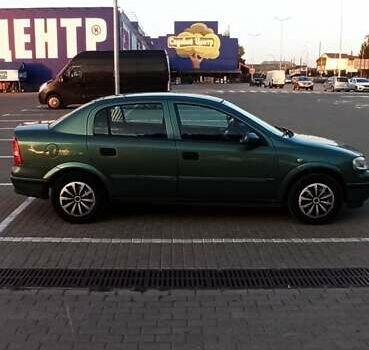 Зеленый Опель Астра, объемом двигателя 1.6 л и пробегом 410 тыс. км за 2900 $, фото 11 на Automoto.ua