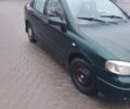 Зеленый Опель Астра, объемом двигателя 1.4 л и пробегом 300 тыс. км за 2400 $, фото 1 на Automoto.ua