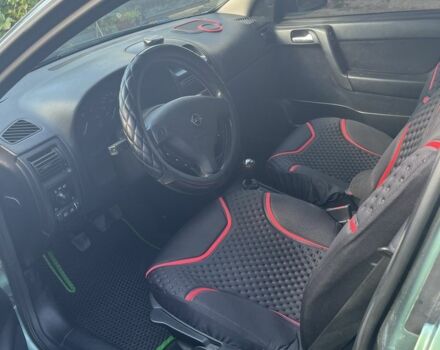 Зеленый Опель Астра, объемом двигателя 1.6 л и пробегом 350 тыс. км за 2500 $, фото 7 на Automoto.ua