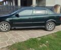 Зеленый Опель Астра, объемом двигателя 1.6 л и пробегом 250 тыс. км за 2106 $, фото 1 на Automoto.ua