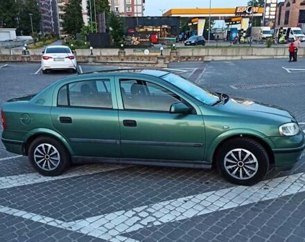 Зелений Опель Астра, об'ємом двигуна 1.6 л та пробігом 408 тис. км за 2999 $, фото 11 на Automoto.ua