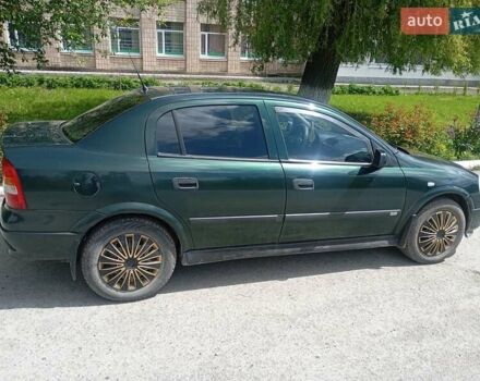 Зеленый Опель Астра, объемом двигателя 1.6 л и пробегом 310 тыс. км за 2799 $, фото 2 на Automoto.ua