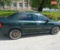 Зеленый Опель Астра, объемом двигателя 1.6 л и пробегом 310 тыс. км за 2799 $, фото 2 на Automoto.ua